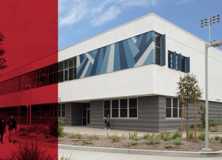 Exterior view of a building with a blue graphic
