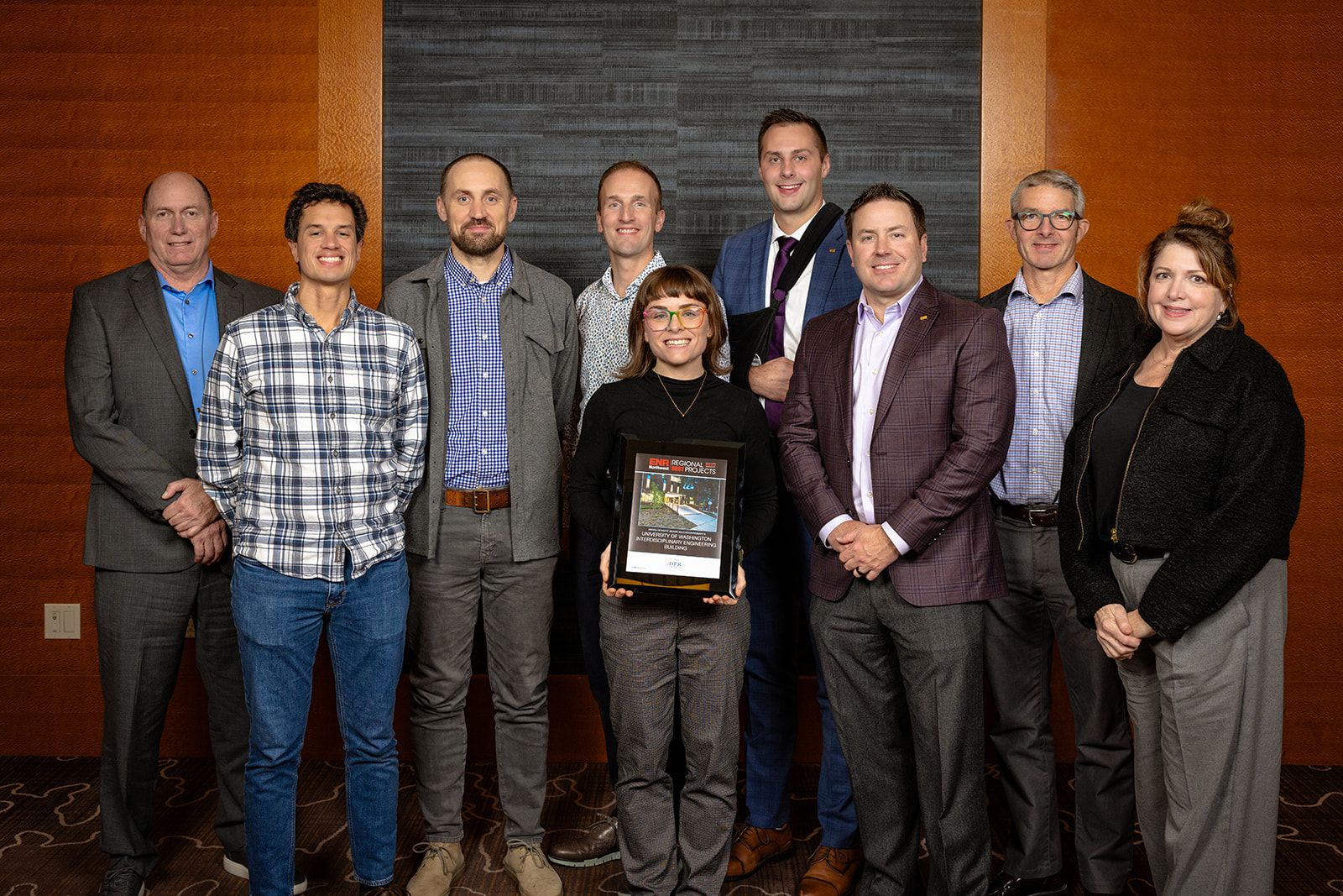 Hensel Phelps employees accepting award in a group photo.