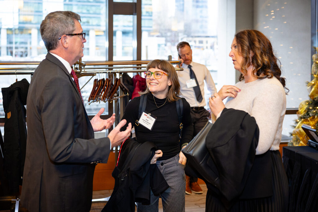 Project Superintendent Kabri Lehrman-Schmid networking with fellow construction industry professionals.