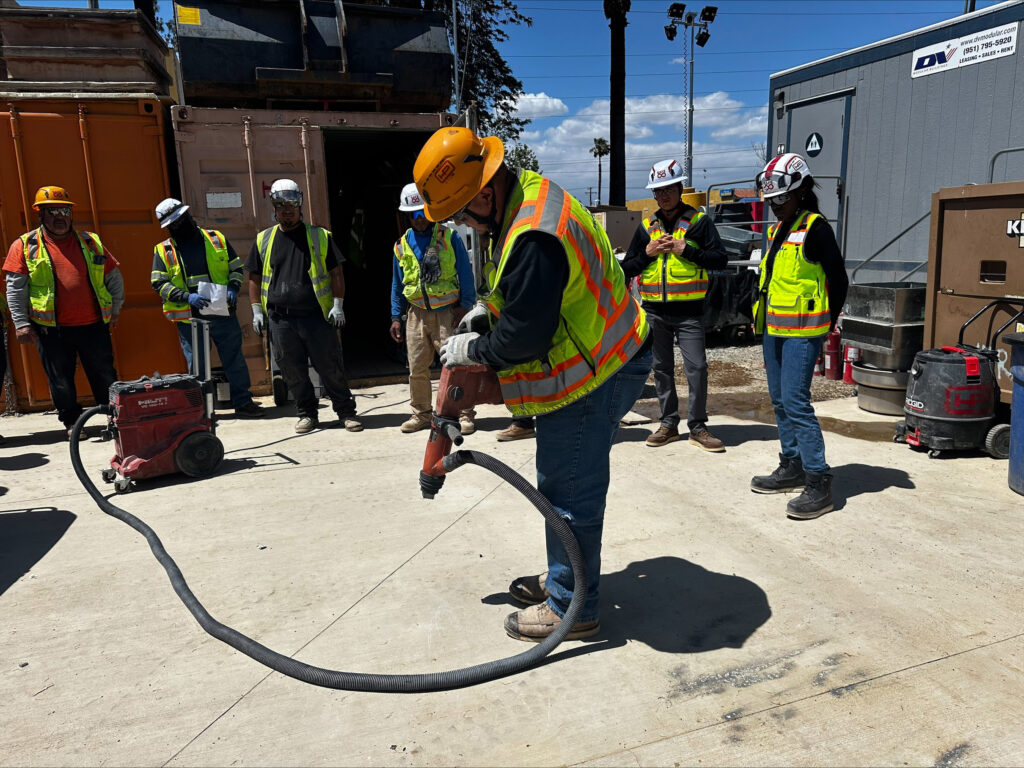 Richard Castro performing a safety demonstration with a rotary hammer at the Kaiser Permanente Riverside Medical Center project in Riverside, California.