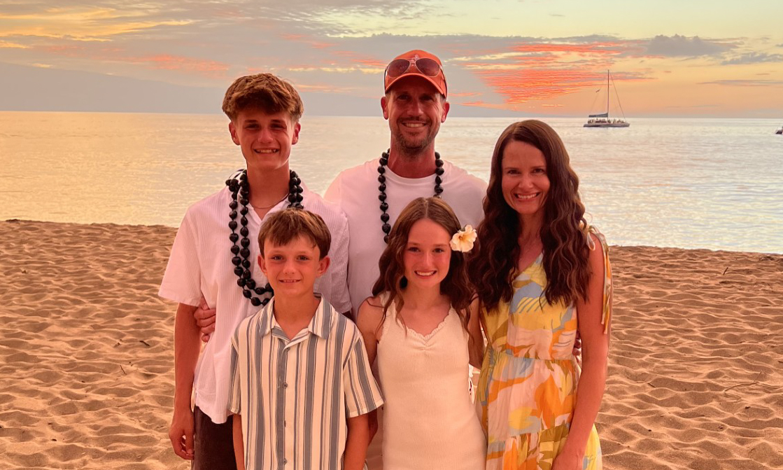 Cole and his family on a beach