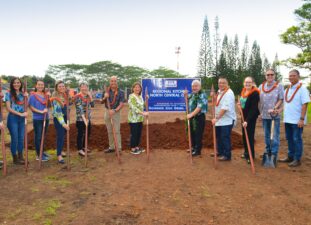 groundbreaking participants hold shovels next to sign that says "Regional Kitchen North Central Oahu