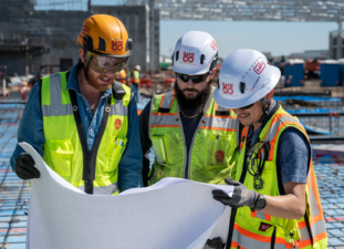 operations team looks at project plans