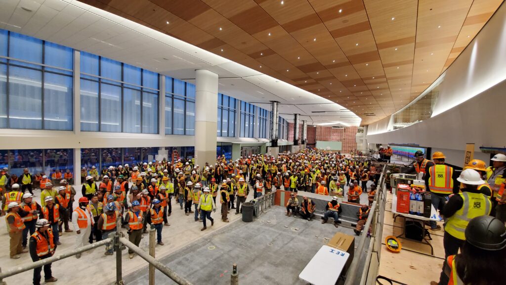 The Harvey Milk Terminal 1 project staff gathered together, celebrating the project team and their collective efforts.