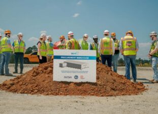 Group of people celebrating the Y810 project groundbreaking