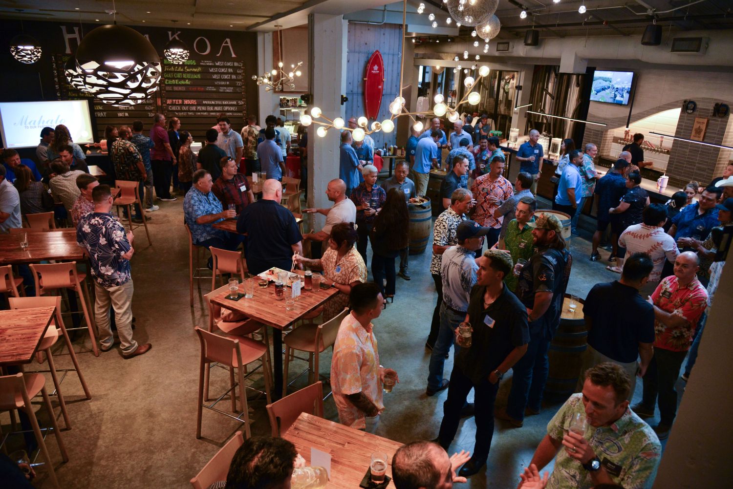 Owners. trade partners, project team members, and industry partners gather for a group photo during a Trade Partner Appreciation event in Hawaii.